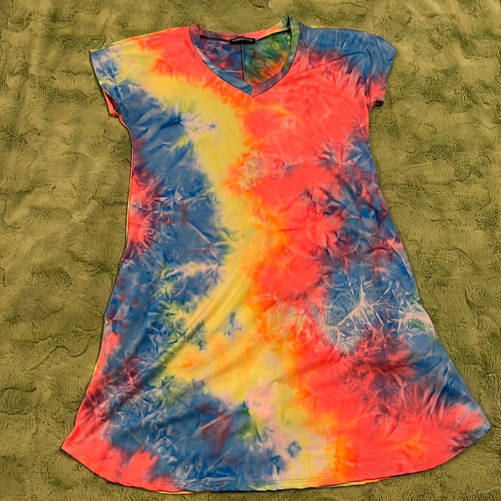 Silly tie dye size large, fits size 10-14; worn twice